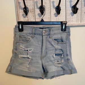 light blue ripped jean shorts
